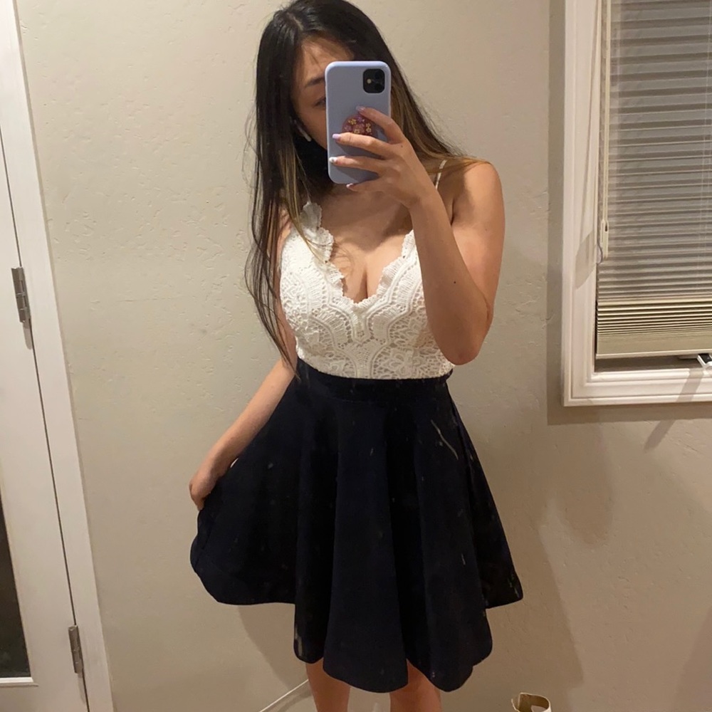 Papaya lace and navy blue dress